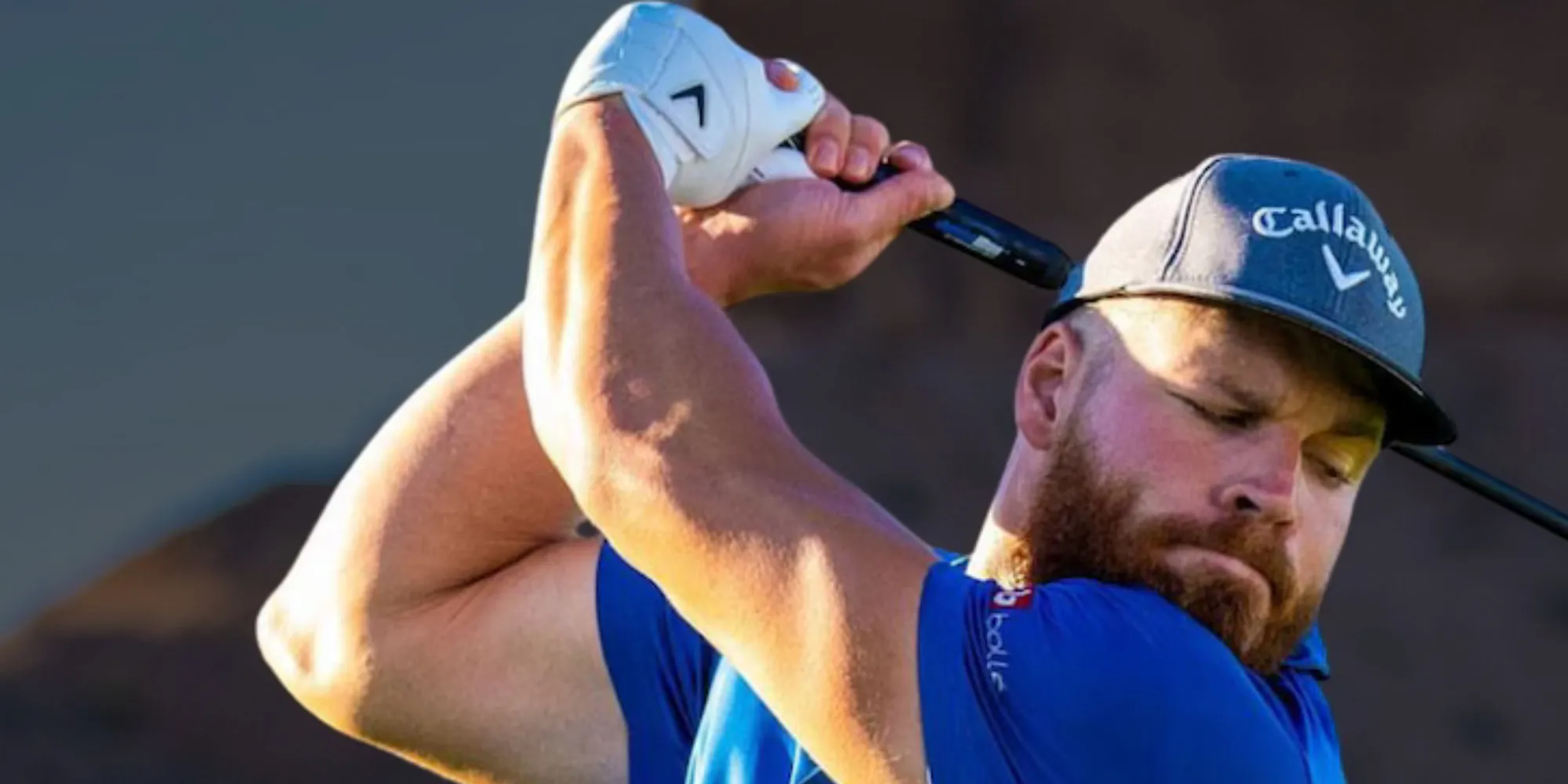 Martin Borgmeier at the top of the backswing