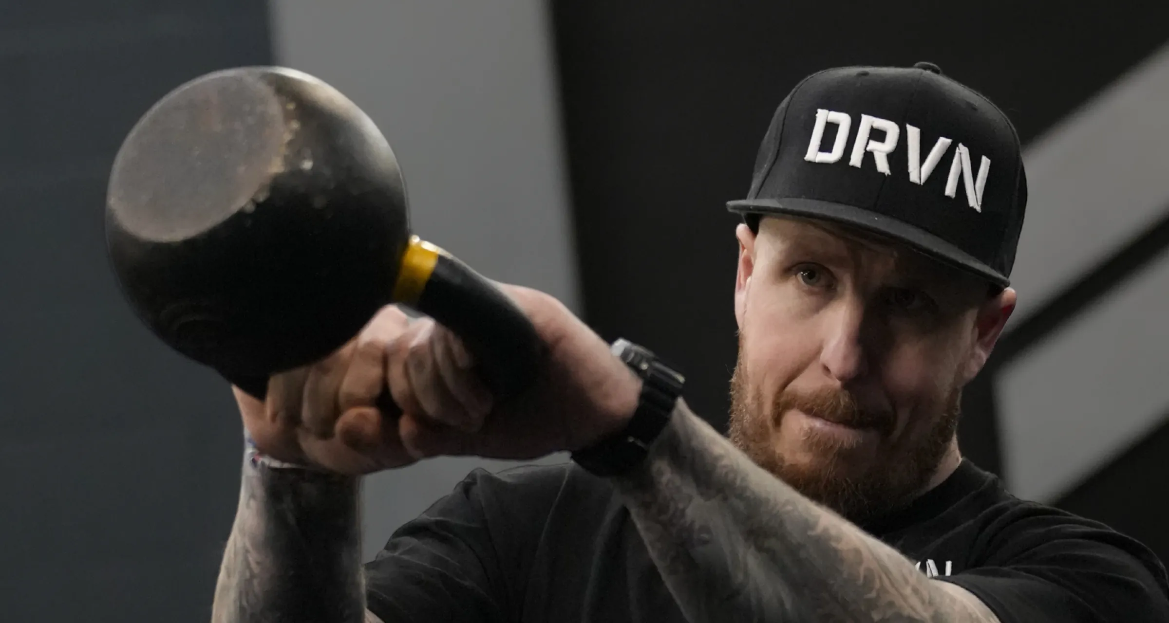Michael Dennington training with a kettlebell